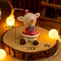 Miniature Christmas lamb figurine in red hat and cape on a rustic wooden slice base - Red Cape Christmas Sheep Design (No. 17)