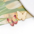 Detail of colorful butterfly alloy pendant showing gradient enamel finish and golden textured back - 19055 Multicolor Gradient Butterfly