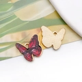 Macro detail of butterfly charm showing red oil-drip texture and golden back pattern - 19057 Dark Red Pattern Butterfly