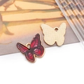 Detailed view of red gradient butterfly charm with gold metal edges for DIY jewelry making - Printed Flower Butterfly Style (19057)