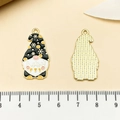 Macro view of Christmas gnome enamel pendants showing front details and metallic back - Carnival Gnome (21712) / 30x15mm