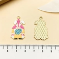 Detail view of gnome pendant with bunny ears and Easter egg next to a metric scale - Easter Gnome (21711) / 30x17mm