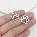 Pair of silver hollow cat paw pendant charms for creative DIY jewelry making - Antique Silver Hollow Paw (7113)