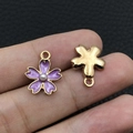 Macro detail of purple enamel flower pendant with pearl center and golden alloy ring - Purple Enamel Pearl Cherry Blossom (17542)