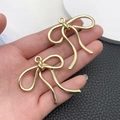 Golden bow pendant with hanging ring for DIY necklace and bracelet jewelry making - Large Bowknot (21378)