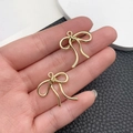 Pair of KC gold-plated bow-shaped charms with hanging loops for DIY jewelry making - Small Bowknot (21382)