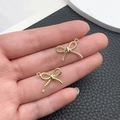 Colgantes de lazo dorado con textura de cuerda y anilla para creación de joyas DIY - Lazo de Cuerda Trenzada (21386)