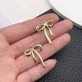 Colgantes de lazo en oro KC con circonitas para la creación de joyas y collares DIY - Lazo con Pedrería (21394)