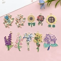 Set di 10 ciondoli a fiori smaltati inclusi girasoli per creazione gioielli fai da te - Set Serie Fiori Smaltati (SN1100)
