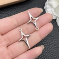 Silver antique style four-pointed star charms for DIY necklaces and keychains - Antique Silver Large Hollow Four-Pointed Star 15x25mm (16048)
