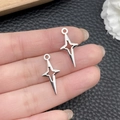 DIY silver star pendant accessories held by hand on black leather background - Antique Silver Small Cross Four-Pointed Star 10x23mm (16970)