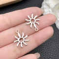 Bright silver sun pendant charm with radiant spokes for jewelry making projects - Antique Silver Sun 19x15mm (21506)