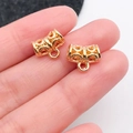Detalle de fianza de tubo curvado de oro KC vintage para creación de joyas DIY - Bélière 9x12mm (20657) / Agujero 3.4mm