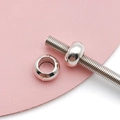 Macro shot of silver large-hole spacer bead with a polished finish for DIY bracelets - Antique Silver Round Bead (15679)