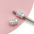 Detail of silver Love Bravely engraved charms on a metal rod for DIY bracelet making - Antique Silver Letter Tag Bead (15684)