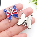 Detail of butterfly alloy pendant with American flag pattern and white rhinestones - Independence Day Butterfly (19173)