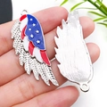 Detailed view of American flag wing pendant showing front enamel and back metal texture - Independence Day Left Wing (19082)