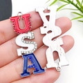 Macro view of USA letter pendant with red, white, and blue enamel and crystal inlay - Independence Day USA Letters (19071)