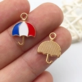 Detailed macro view of umbrella shaped alloy charms with red white blue enamel finish - KC Gold Enamel USA Flag Umbrella Style (16279)