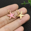 Pink enamel starfish pendant with gold textured edge and metallic hanging loop - Enamel Pink Starfish (8612)