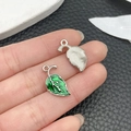 DIY handmade leaf-shaped jewelry pendant in emerald green enamel with silver metal frame - Green Enamel Leaf (21916)
