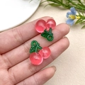 Detail of pink acrylic cherry charms with green leaves for DIY jewelry making and crafts - Rose Red Cherry (22163)
