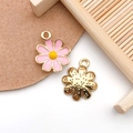 Close-up of pink and yellow daisy flower pendants for DIY jewelry making - Pink Enamel Daisy Style (16489)