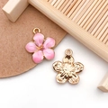Detail of pink enamel flower charms and golden alloy pendants for DIY jewelry crafts - Pink Enamel Cherry Blossom Style (10961)