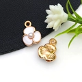 DIY flower charm with white petals and gold trim showing front and back details - Beaded Small White Flower Pendant (11035)