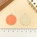 Gouden basketbal bedeltje met oranje emaille voor DIY sleutelhanger knutselen - Basketbal (21719) / 29x26mm / Oranje Emaille