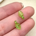 Close-up of green acrylic leaf charms with detailed veins for DIY jewelry making - Green Mini Leaf (22138)