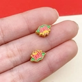 Detailed view of handmade enamel lotus beads for DIY jewelry making held in hand - Matte Gold Small Lotus Spacer Bead (22472) / 1 Piece/Pack (10x7mm) / Green & Red