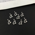 Macro shot of silver metal lowercase letter a pendants for DIY jewelry making - Letter A