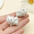 Close-up of white flocked puppy pendants with pink details and silver rings - White Pink Samoyed Dog (23141)