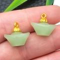Macro view of two mini gold-capped faux jade pendants in traditional ingot shape - Light Green Glace Zinc Alloy Sycee (22204)