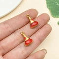 Golden broom-shaped alloy pendant with red enamel and traditional Chinese engravings - Red Drip Oil Zinc Alloy Broom Pendant (22225)