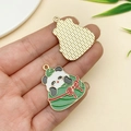Panda and zongzi enamel charm in golden finish for DIY jewelry and keychains - Bowknot Zongzi Panda (23044)