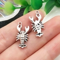 Detail shot of antique silver lobster pendants for DIY jewelry and keychain making - Crayfish Style (22307)