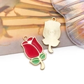 Detailed macro view showing the enamel front and metallic textured back of a rose charm - Large Enamel Red Rose