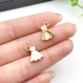 DIY gold-plated white enamel dress charm showing front and back textured details - Small Black Shuttlecock (21737) / 14x11mm