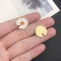 Macro shot of colorful daisy flower pendants showing front enamel and gold textured back details - White Enamel Single Faced Sunflower (12062)