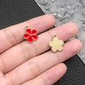 Detail of red enamel daisy charm with gold plating and textured metal back for DIY crafts - Red Enamel Flower (11877)