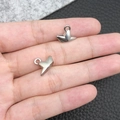 Polished silver origami boat charm held in hand for DIY bracelet jewelry making - Silver Star Shape (19852)