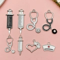 Silver medical themed charms set with stethoscope and syringe for DIY jewelry making - Silver Medical Collection Multiple Designs (SN1229)