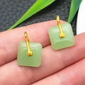 Square green faux jade earrings with elegant gold metal hooks held in hand - Light Green Glace Zinc Alloy Square Buckle (22207)