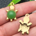 Golden turtle jewelry charms with green resin inlay and detailed tortoiseshell back - Green Glace Zinc Alloy Chinese Turtle (22211)