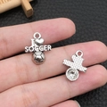 Close-up of silver metal soccer pendant with I Heart Soccer text for DIY jewelry - I Love Soccer Style (11148)