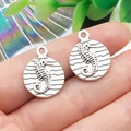 Pair of antique silver seahorse pendants with embossed sea waves for DIY jewelry making - Round Seahorse Style (22293)