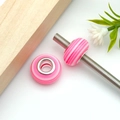 Pink and white striped resin large hole charm bead with a durable silver metal core - Round Striped Large Hole Bead (17952)