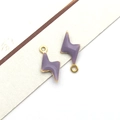 Detail showing two purple enamel lightning bolt pendants with gold metal edges and hanging rings - Gold Purple